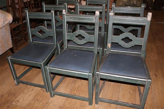A set of eight green painted harwood dining chairs, with drop in seats